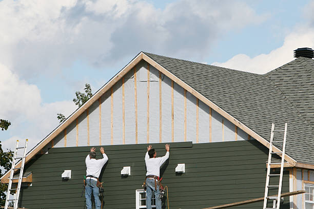Professional Siding Contractor technician working in Etowah, NC